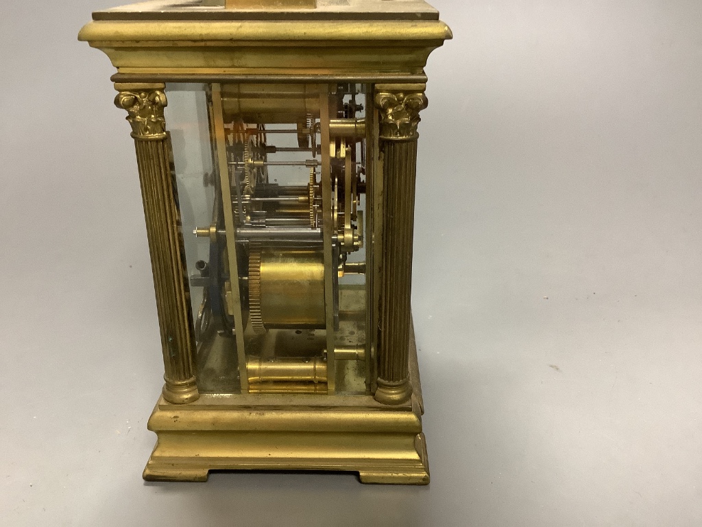 A large French gilt brass repeating carriage clock, signed EM and co. 16cm